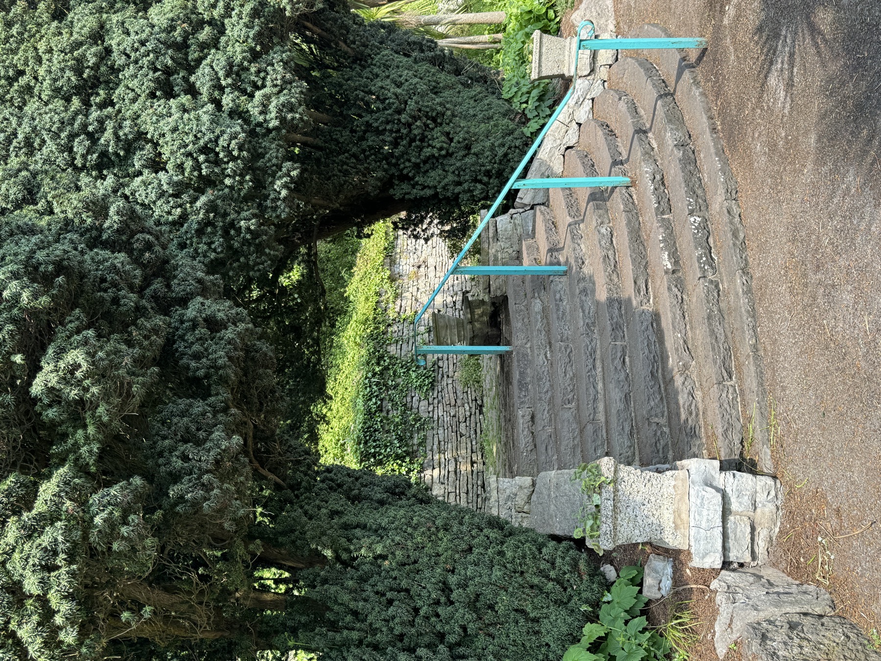 Stone steps and turquoise railings in Italian Gardens Penarth