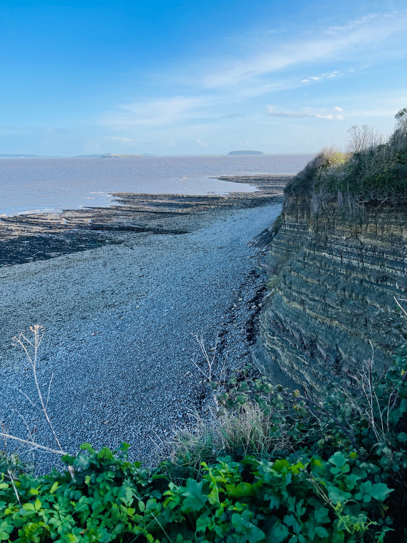 Flat Holm and Steep Holm beyond the layered cliffs at Lavernock